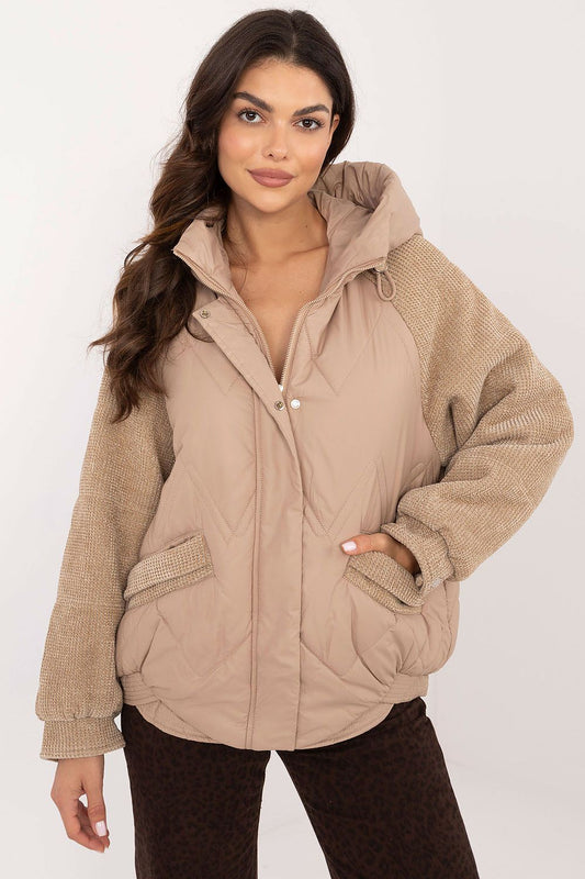 Light brown winter jacket with knitted sleeves