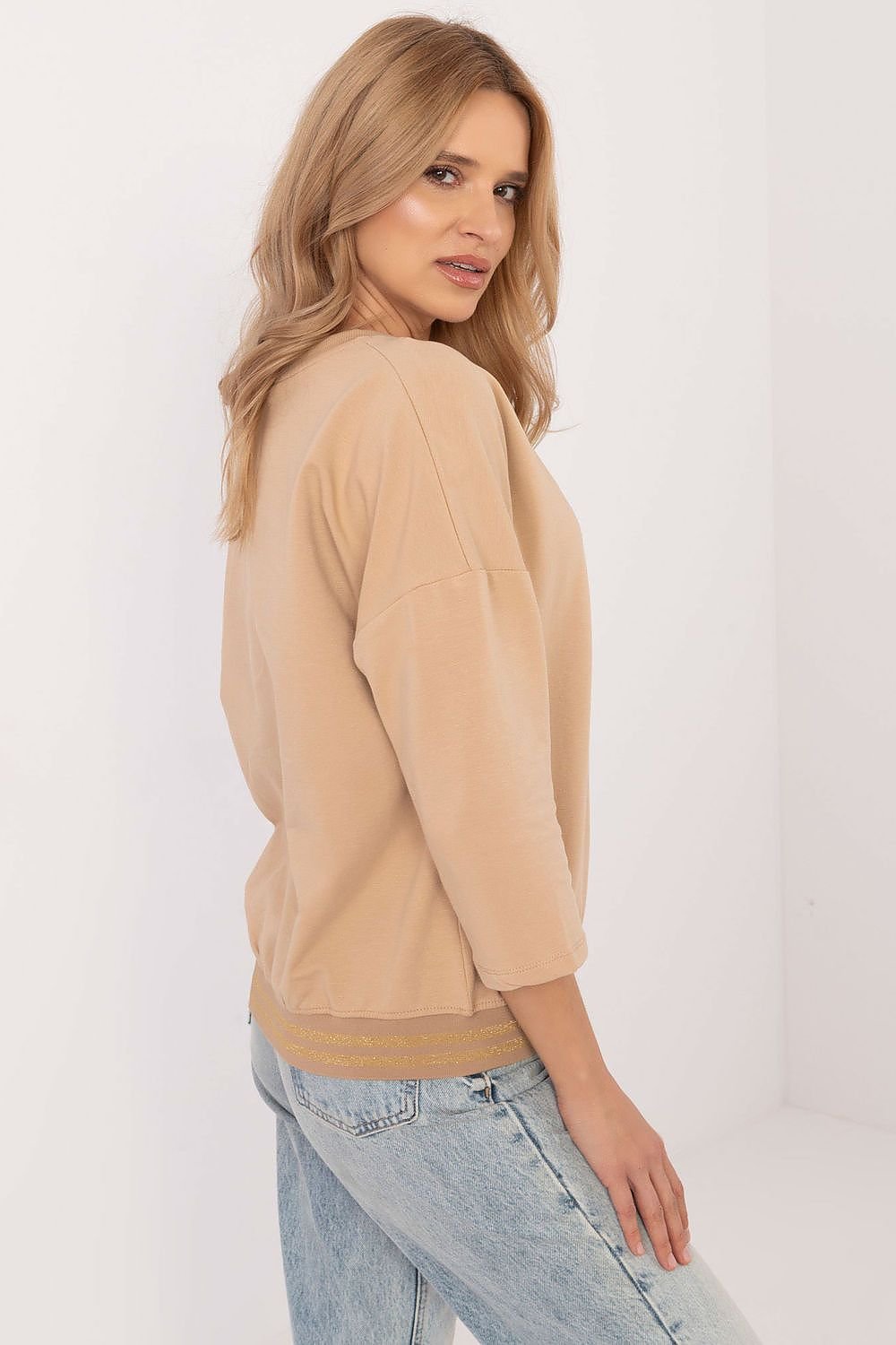 Beige long-sleeved blouse