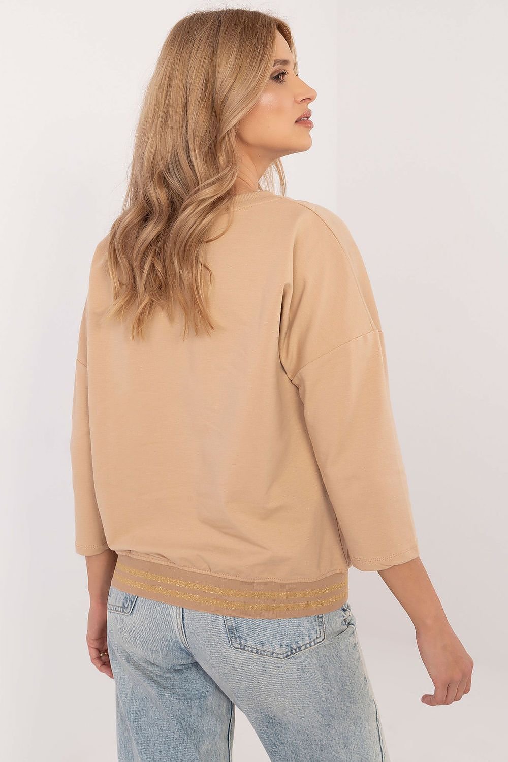 Beige long-sleeved blouse